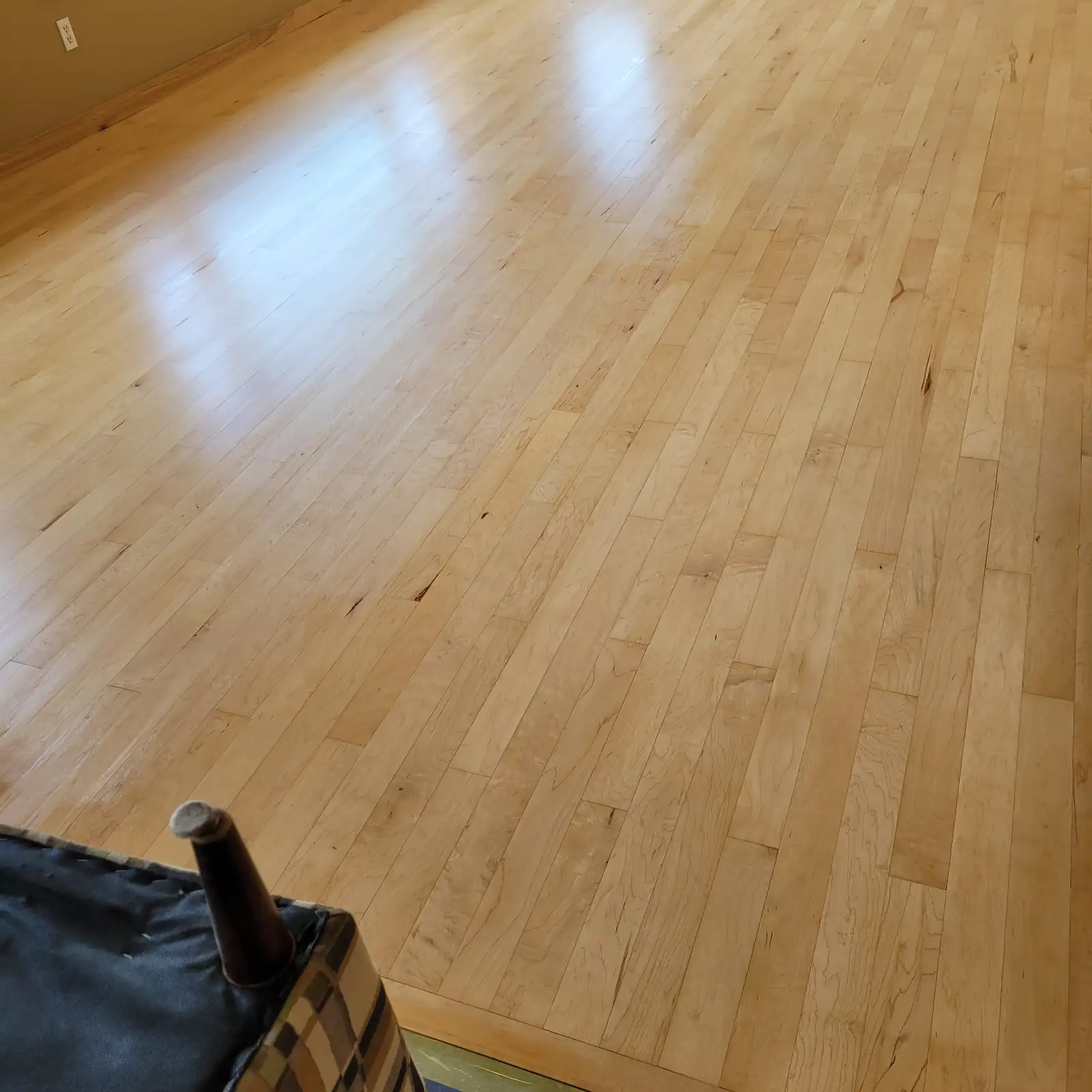 Refinished maple floor with a clear satin finish